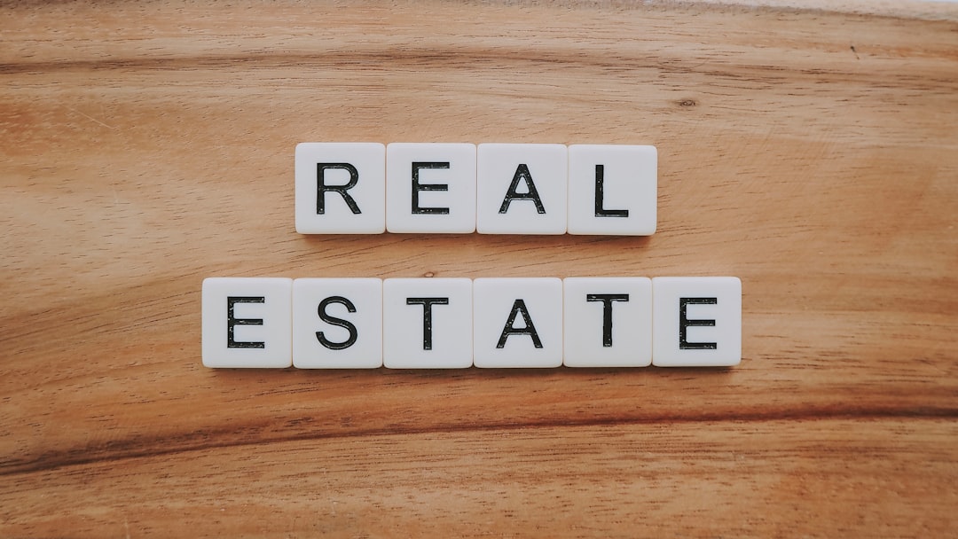 Real estate investing for beginners cover with a house, calculator, and key icons